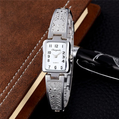 Montre Femme Quartz TINUORA TMC383 — Boîtier Rectangulaire Acier Inox, Chiffres Arabes, Style Luxe