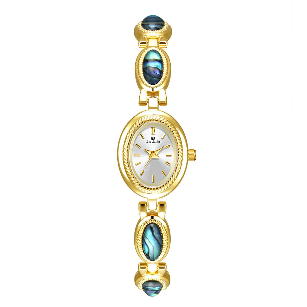 Femmes élégantes Bracelet montres conception Unique mode dames montres pour femme horloge Quartz montres haut de gamme de luxe