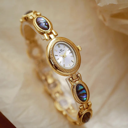 Femmes élégantes Bracelet montres conception Unique mode dames montres pour femme horloge Quartz montres haut de gamme de luxe