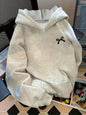 Sweat-shirt à capuche pour femme de style européen 2026, sweat-shirt à motifs imprimés, sweat-shirt ample et confortable avec poches